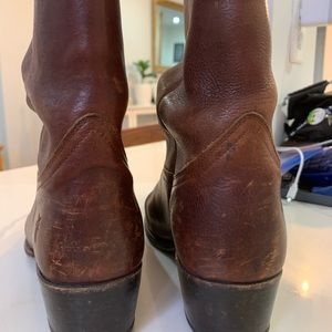 Brown cowboy-like boots
